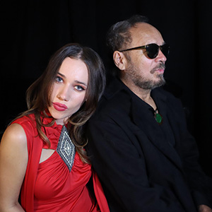 Performers Ella Blu and Magrus Borges posing for a photograph